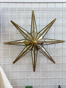 Miroir étoile avec bordures dorées